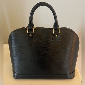 Louis Vuitton Textured Black Satchel with Gold Accents